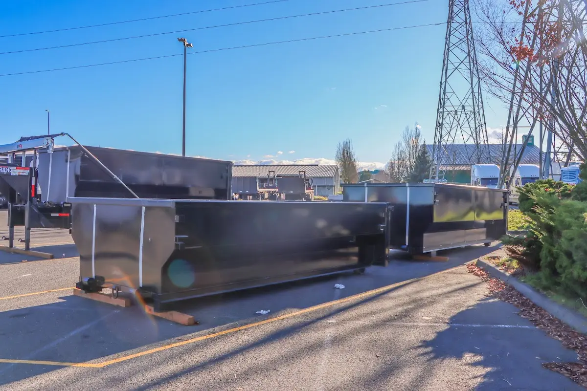 Roll-off dumpster ready for waste disposal at job site for 4 Yard Dumpster Rental in Newark